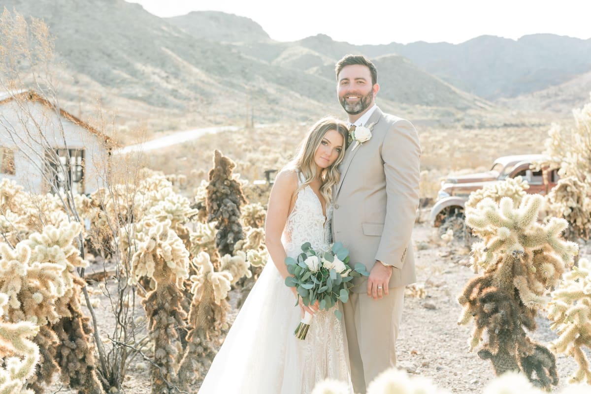 bride and groom in the desert